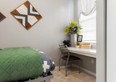 bedroom of an apartment at cadence at southern university